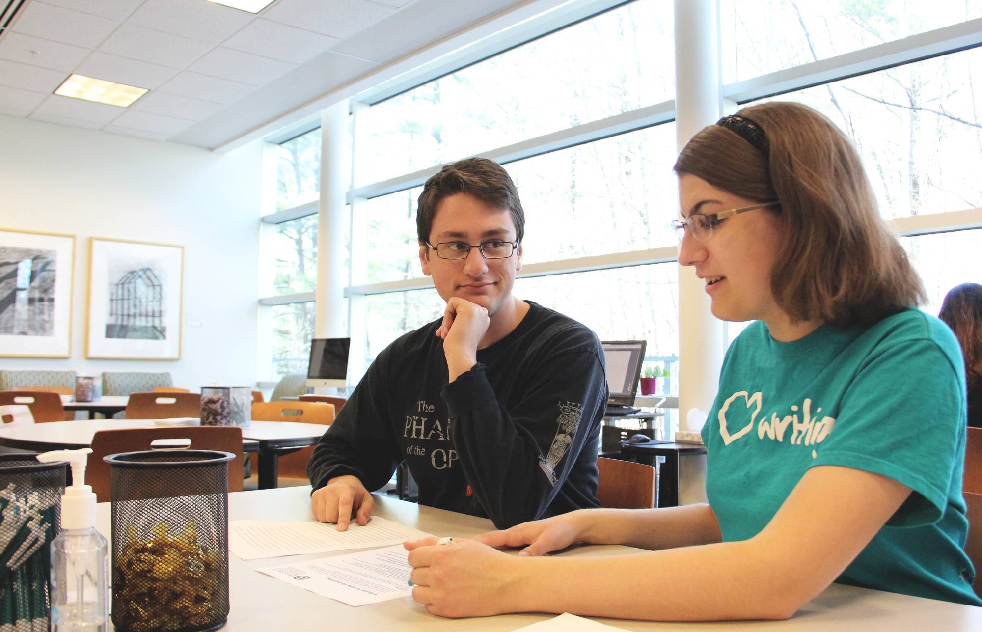 a consultant and a student working together at a table